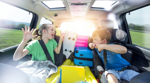 Holidays - Siblings arguing in the car during a long car journey