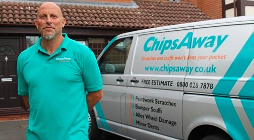 chipsaway franchisee stood next to a chipsaway van