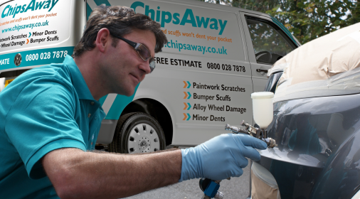 chipsaway specialist repairing a bumper