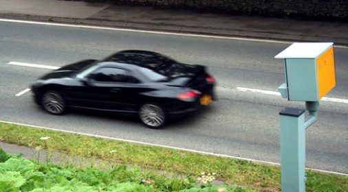 a speed camera on a road