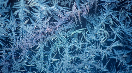 background made of winter frozen window glass