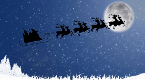 Santa Claus with reindeer sleigh flying against the moon